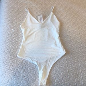 NWT white body suit!